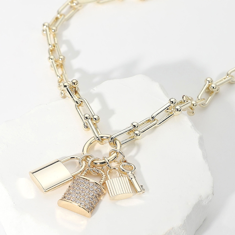 Gold Charm Necklace with Lock and Key Pendants